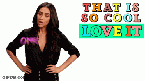 A Woman Is Standing In Front Of A Sign That Says That Is So Cool Love It Omg GIF