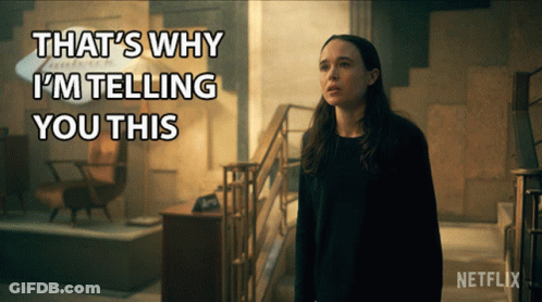 A Woman Is Standing In Front Of A Sign That Says That 'S Why I 'M Telling You This On It GIF