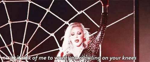 A Woman Is Standing In Front Of A Spider Web And Says Is It Sick Of Me GIF