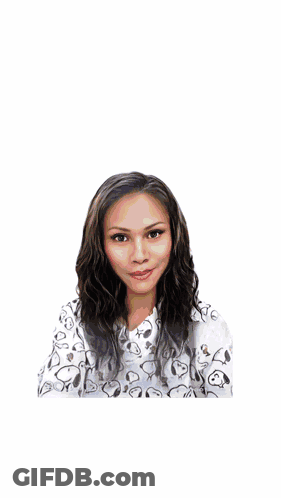 A Woman Is Standing In Front Of A Star Shaped Background That Says Starmaker GIF