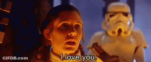 A Woman Is Standing In Front Of A Stormtrooper And Saying `` I Love You '' . GIF