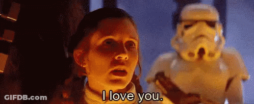A Woman Is Standing In Front Of A Stormtrooper And Saying `` I Love You '' . GIF