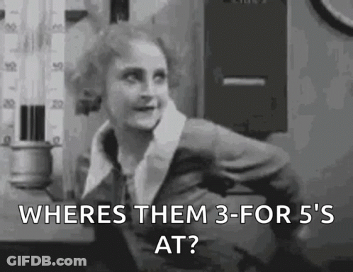 A Woman Is Standing In Front Of A Thermometer In A Black And White Photo . GIF