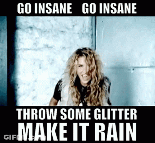 A Woman Is Standing In Front Of A Wall With A Caption That Says Go Insane Go Insane Throw Some Glitter Make It Rain . GIF