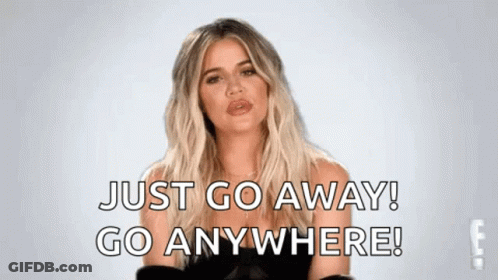 A Woman Is Standing In Front Of A White Background And Saying `` Just Go Away ! Go Anywhere ! '' GIF