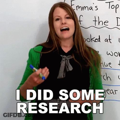 A Woman Is Standing In Front Of A White Board And Says I Did Some Research GIF