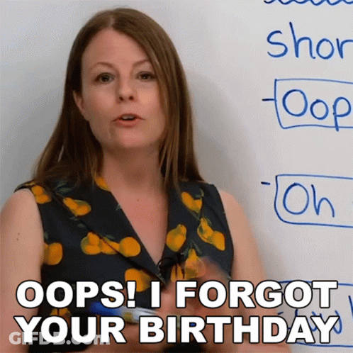 A Woman Is Standing In Front Of A White Board And Says " Oops I Forgot Your Birthday " GIF