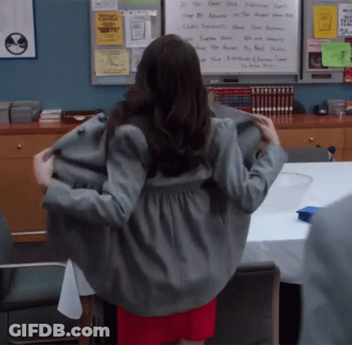 A Woman Is Standing In Front Of A Whiteboard That Says " All The First Dick " GIF