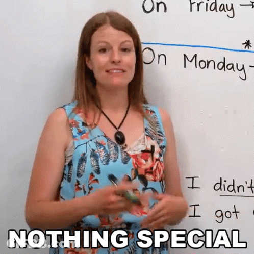 A Woman Is Standing In Front Of A Whiteboard With The Words Nothing Special Written On It GIF