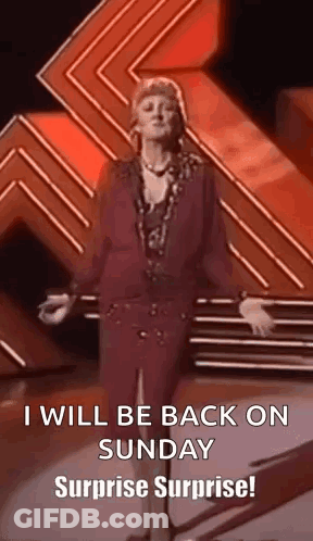 A Woman Is Standing On A Stage With Her Arms Outstretched And Says `` I Will Be Back On Sunday Surprise Surprise ! '' GIF