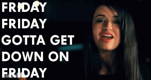 A Woman Is Sticking Her Tongue Out In Front Of A Sign That Says Friday Friday Gotta Get Down On Friday . GIF