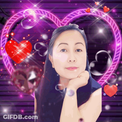 A Woman Is Surrounded By Hearts And Bubbles And Has Her Hand On Her Chin GIF