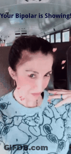 A Woman Is Taking A Picture Of Herself On A Bus With The Words " Your Bipolar Is Showing " On The Bottom GIF