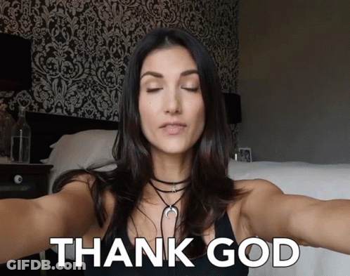 A Woman Is Taking A Selfie With The Words Thank God Behind Her GIF