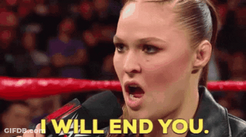 A Woman Is Talking Into A Microphone And Says I Will End You GIF