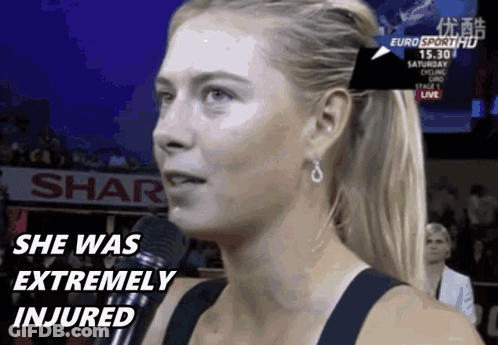 A Woman Is Talking Into A Microphone And The Words She Was Extremely Injured Are On The Screen GIF