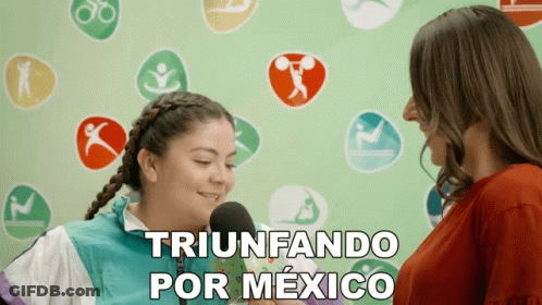 A Woman Is Talking Into A Microphone And The Words Triunfando Por Mexico Are On The Bottom GIF