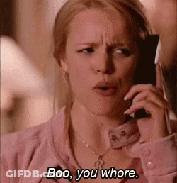 A Woman Is Talking On A Cell Phone And Says `` Boo , You Whore '' . GIF