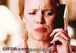 A Woman Is Talking On A Cell Phone And Says Boo You Whore ! GIF