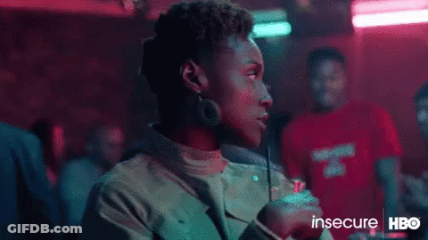 A Woman Is Talking On A Cell Phone And The Word Awkward Is On The Screen GIF
