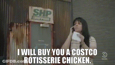 A Woman Is Talking On A Cell Phone In Front Of A Costco Rotisserie Chicken Sign GIF