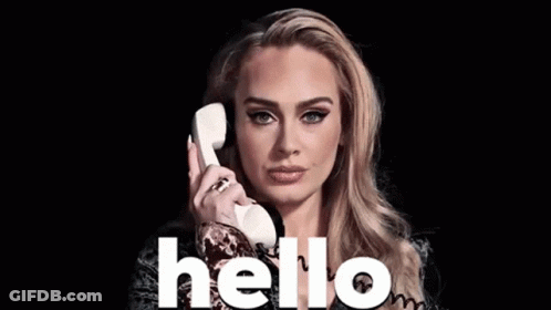A Woman Is Talking On A Telephone With The Word Hello Written On The Bottom GIF