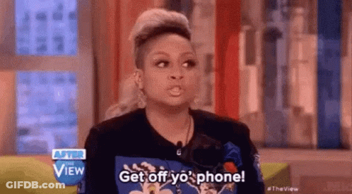 A Woman Is Talking On A Television Show And Saying `` Get Off Yo ' Phone ! '' GIF