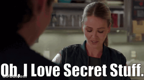 A Woman Is Talking To A Man And Says Oh , I Love Secret Stuff GIF