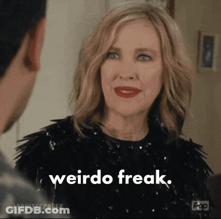 A Woman Is Talking To A Man And Says Weirdo Freak . GIF