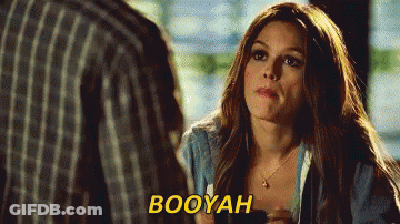 A Woman Is Talking To A Man And The Word Booyah Is Visible GIF