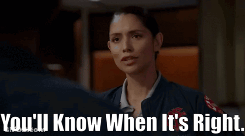 A Woman Is Talking To A Man And The Words You 'Ll Know When It 'S Right Are On The Screen . GIF