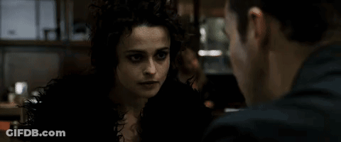 A Woman Is Talking To A Man With The Words " You Have Very Serious Emotional Problems " Below Her GIF