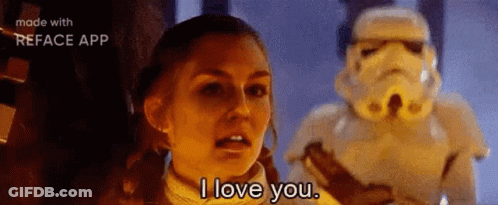 A Woman Is Talking To A Stormtrooper In A Star Wars Movie . GIF