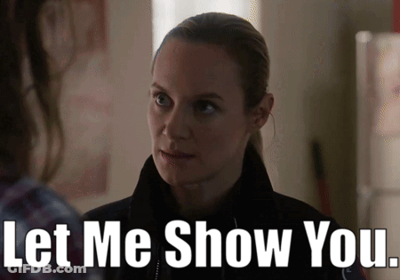 A Woman Is Talking To Another Woman And The Words Let Me Show You Are Above Her GIF
