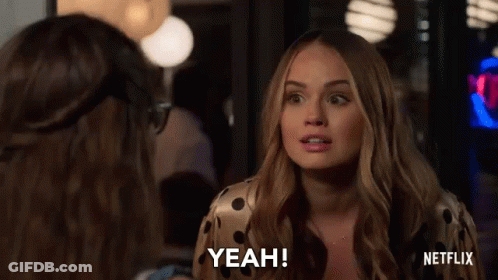 A Woman Is Talking To Another Woman In A Room And Saying Yeah . GIF