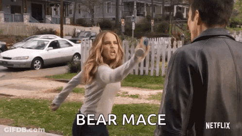 A Woman Is Throwing A Frisbee At A Man In A Netflix Trailer . GIF