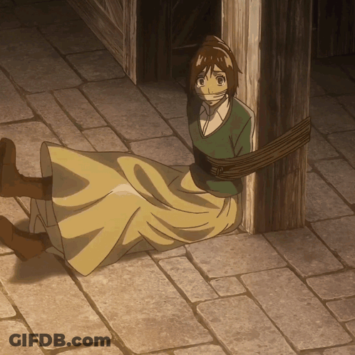 A Woman Is Tied Up With A Rope And Has Her Mouth Taped GIF