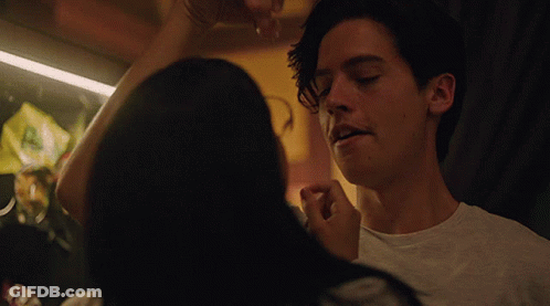 Woman Touching Man's Face Close Up GIF
