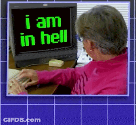 A Woman Is Typing On A Keyboard In Front Of A Computer Monitor That Says I Am In Hell . GIF