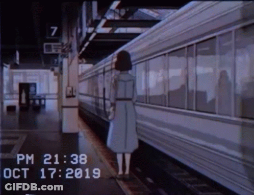 A Woman Is Waiting For A Train At A Station With The Time Of 20:38 On Oct 17 2019 GIF