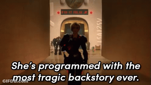 A Woman Is Walking Down A Hallway With The Words She 'S Programmed With The Most Tragic Backstory Ever . GIF
