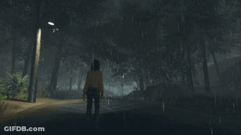 A Woman Is Walking In The Rain In A Dark Forest GIF