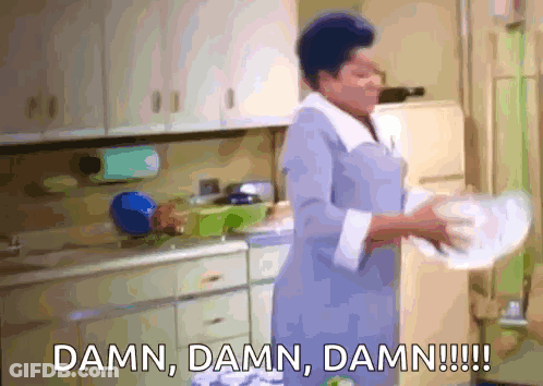 A Woman Is Washing Dishes In A Kitchen And Says Damn Damn Damn GIF