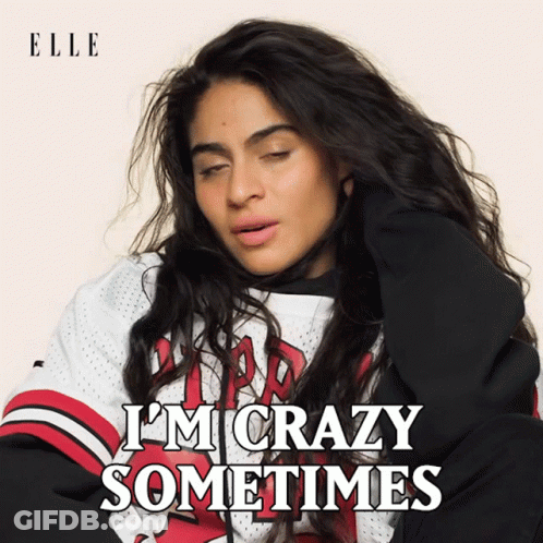 A Woman Is Wearing A Chicago Bulls Jersey And Says I 'M Crazy Sometimes GIF