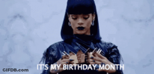 A Woman Is Wearing A Crown On Her Head . GIF