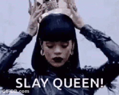 A Woman Is Wearing A Crown On Her Head And Saying Slay Queen . GIF