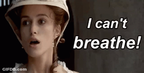 A Woman Is Wearing A Hat And Earrings And Says I Can 'T Breathe . GIF