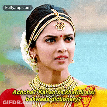 A Woman Is Wearing A Necklace And A Headband And Says Achcha ? GIF