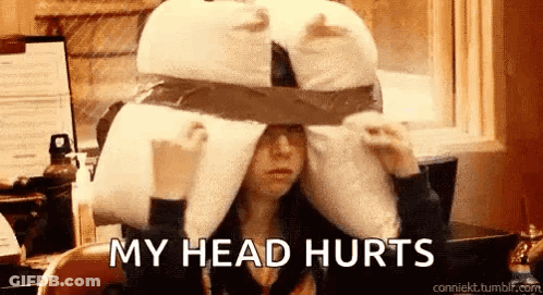 A Woman Is Wearing A Pillow On Her Head And The Words `` My Head Hurts '' Are Written Above Her . GIF