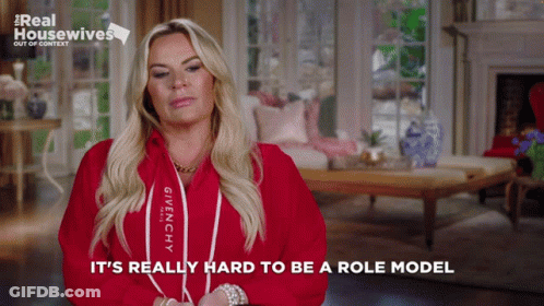 A Woman Is Wearing A Red Givenchy Hoodie And Says It 'S Really Hard To Be A Role Model GIF